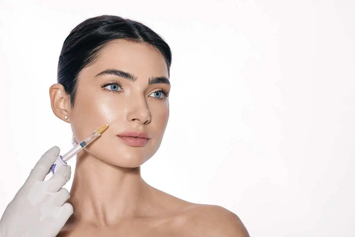 A woman is receiving Dermal Fillers Treatment in Columbia, SC at Sculpted by WH Aesthetics